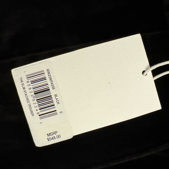 FRAME Slim Stacked Velvet Trousers in Black. - Picture 9 of 10